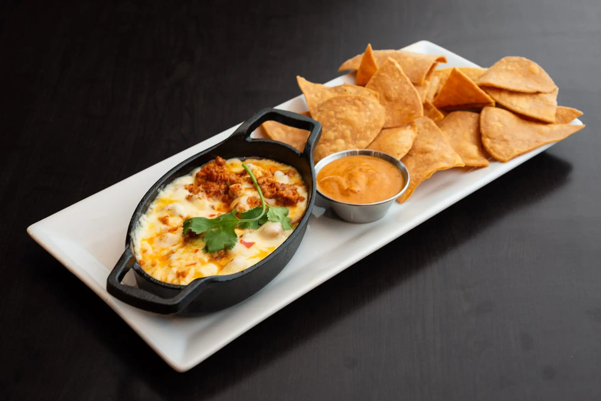 Birria Cantina signature birria tacos with consomé - Best Mexican food in Calgary