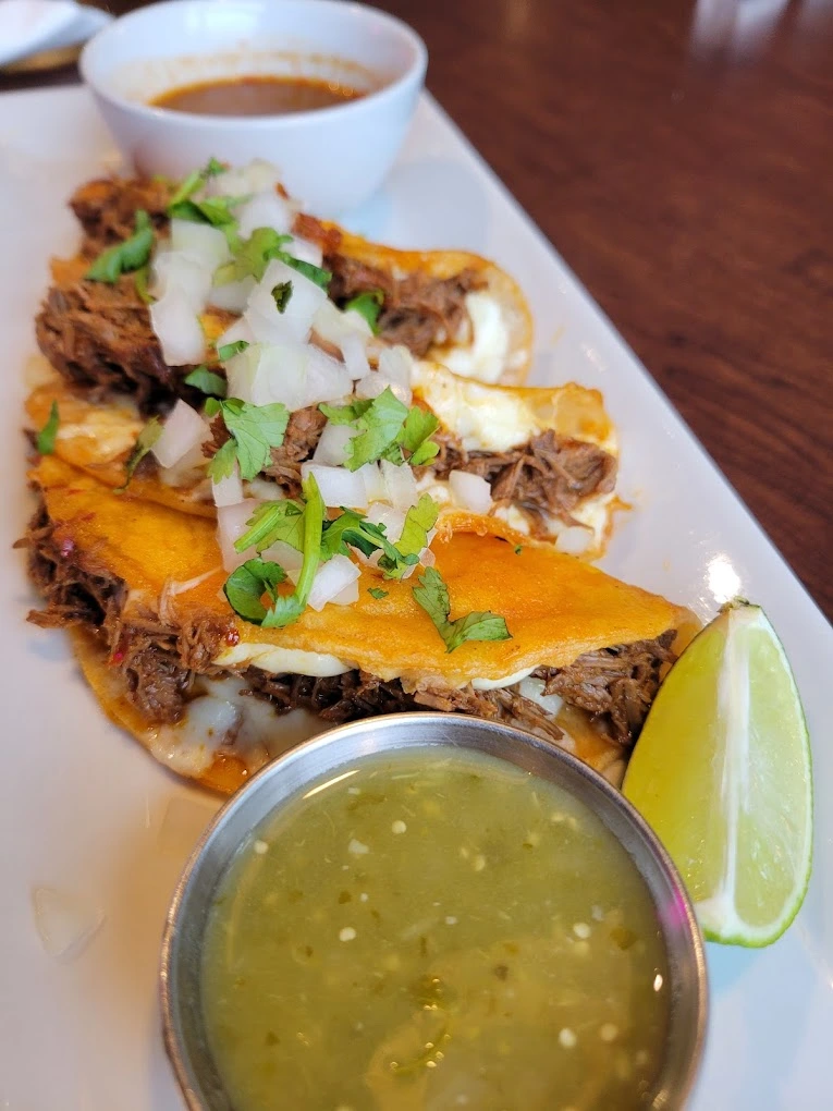 Quesabirria with melted cheese at Birria Cantina Calgary